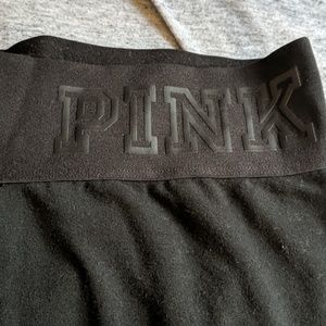 Pink 3/4 length leggings, mesh cut outs on inside